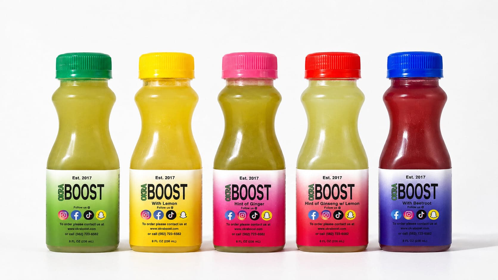 All five OkraBoost flavors — Original, Lemon, Ginger, Beetroot, and Ginseng-Lemon — green, yellow, pink, blue, and red caps on a clean near-white background
